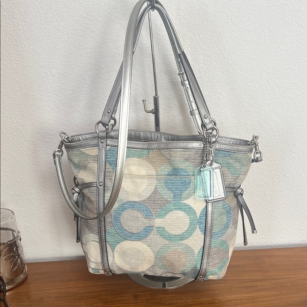 Coach fabric and leather bag w/ 2 large hang tags and coach long adj. strap